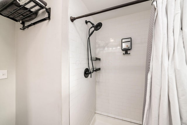 bathroom featuring curtained shower