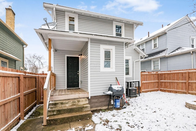 view of snow covered property