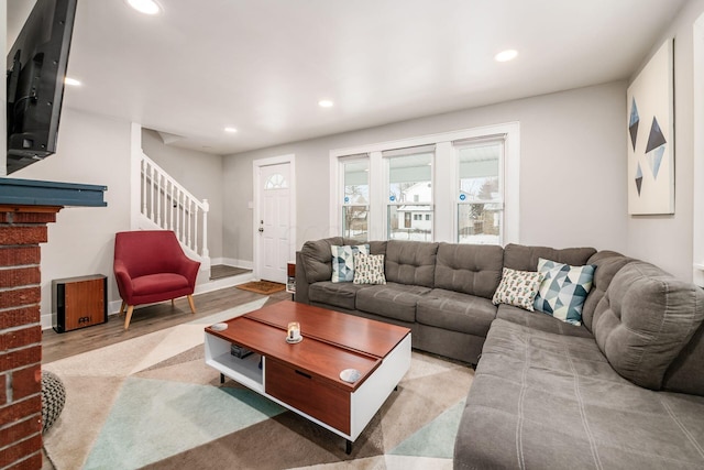 living room with light hardwood / wood-style floors