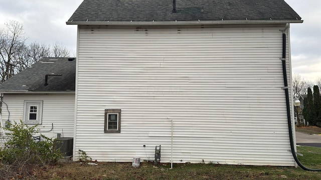 view of home's exterior with central AC unit