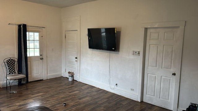 interior space with dark hardwood / wood-style floors