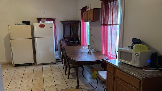 view of tiled dining room