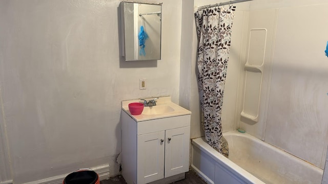 bathroom featuring vanity and shower / bath combo