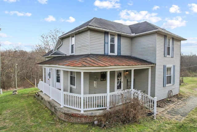 view of front of home featuring covered porch