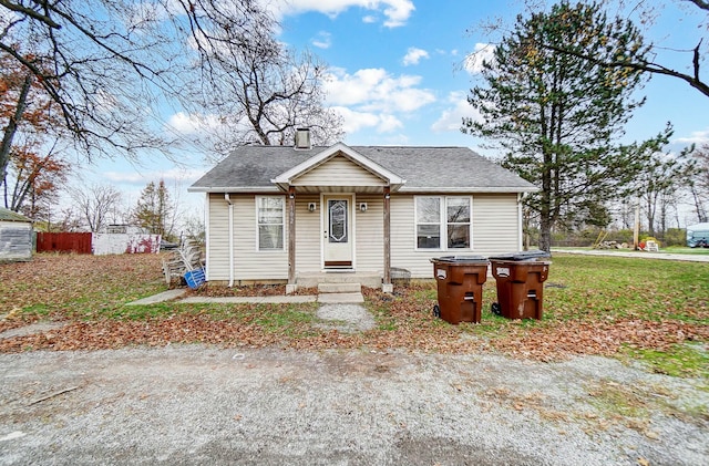 bungalow with a front lawn