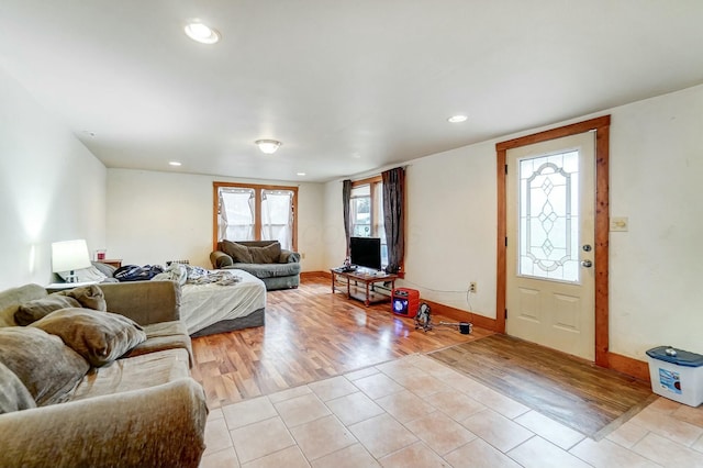 living room with light hardwood / wood-style flooring