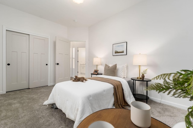 carpeted bedroom featuring a closet