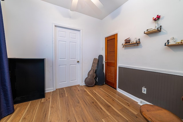 interior space with ceiling fan and light wood-type flooring