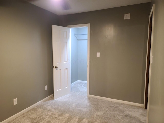 unfurnished bedroom with light carpet