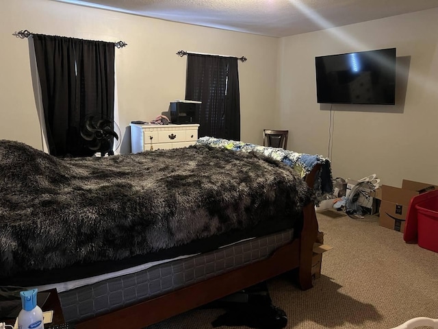 bedroom featuring carpet flooring