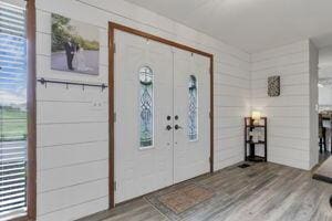 foyer entrance featuring hardwood / wood-style floors