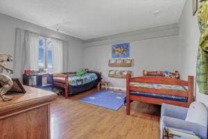 bedroom featuring hardwood / wood-style floors