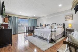 bedroom featuring hardwood / wood-style floors