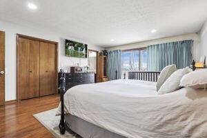 bedroom featuring wood-type flooring