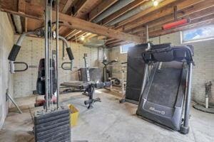 workout room featuring plenty of natural light