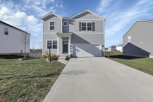 view of front property featuring a garage and a front lawn