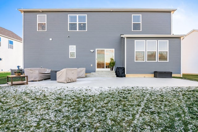 rear view of house with a patio