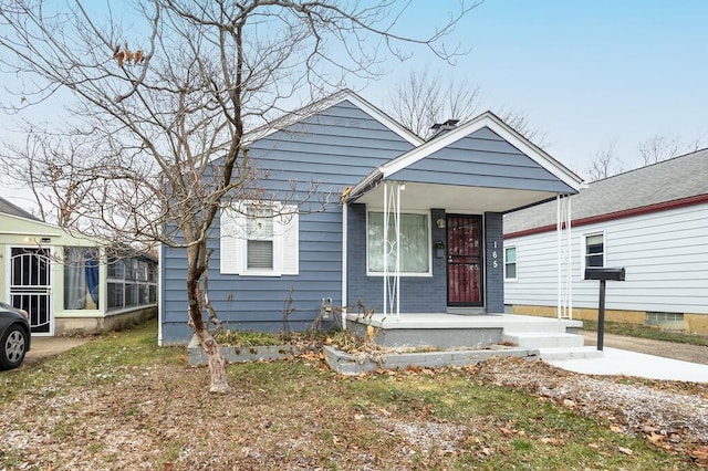 bungalow-style house featuring a porch