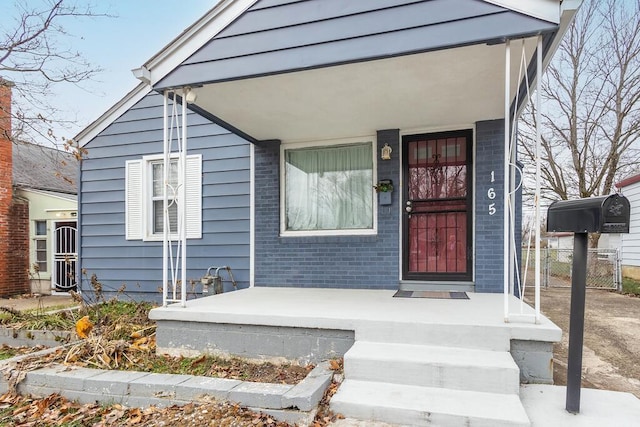 entrance to property with a porch