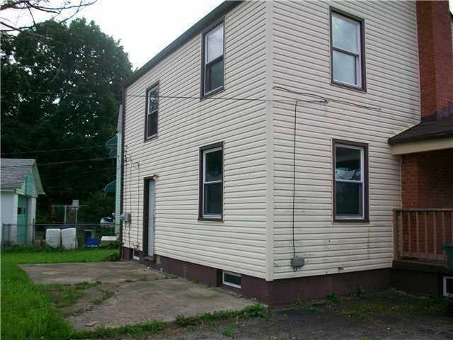 view of property exterior featuring a patio area