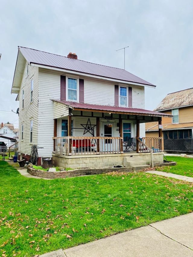 view of front of home featuring a porch and a front lawn