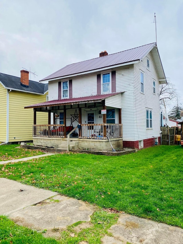 view of front of property with a front lawn and a porch