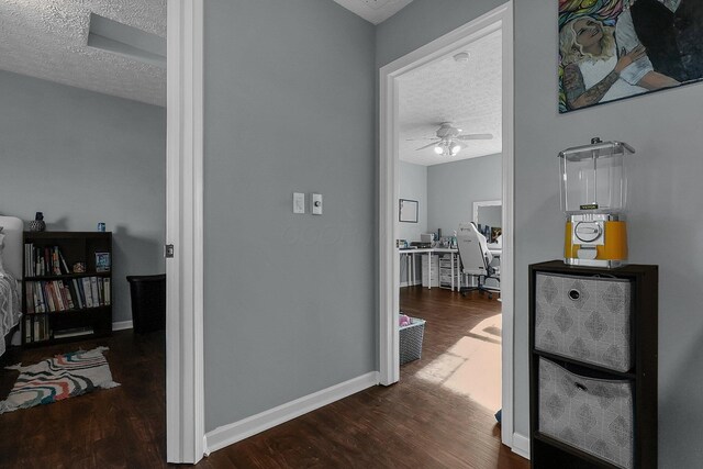 6184 Pirthshire St, Dublin, OH 43016 - corridor featuring baseboards, a textured ceiling, and dark wood finished floors