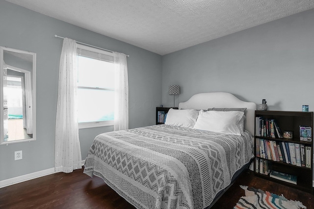 6184 Pirthshire St, Dublin, OH 43016 - bedroom featuring baseboards, wood finished floors, and multiple windows