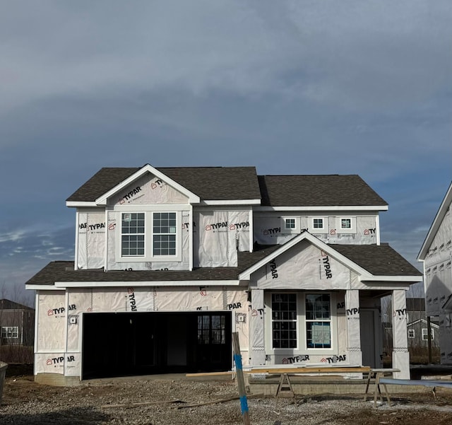 property in mid-construction with a garage