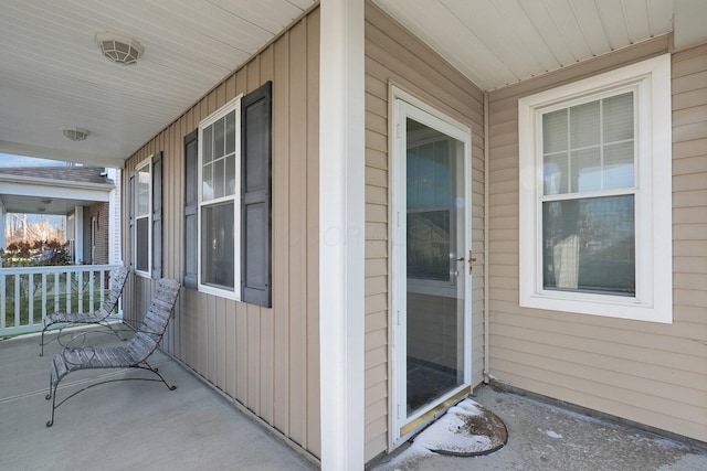 entrance to property with covered porch