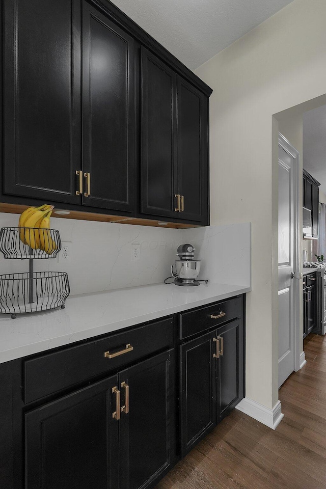 kitchen featuring dark hardwood / wood-style flooring