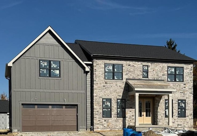 view of front of property with a garage