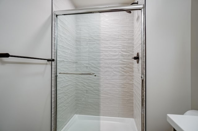 full bathroom featuring a stall shower