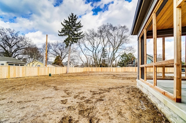 view of yard featuring fence