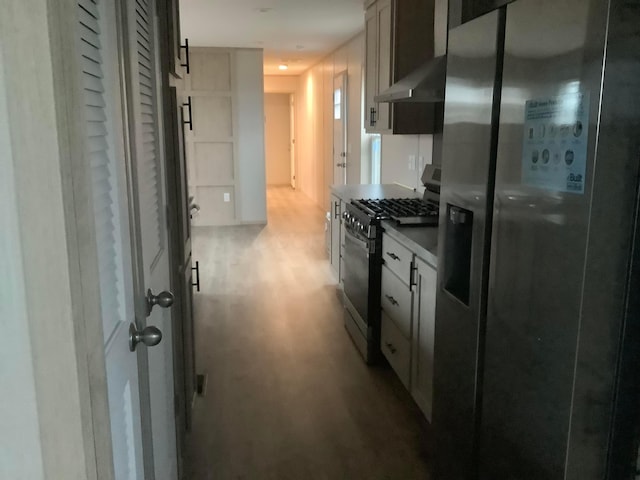 8565 Smith Calhoun Rd Unit 172, Plain City, OH 43064 - kitchen featuring appliances with stainless steel finishes, wood finished floors, and under cabinet range hood