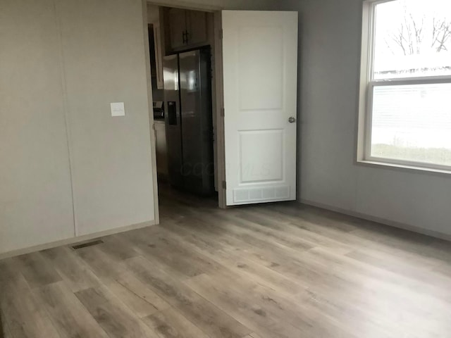 8565 Smith Calhoun Rd Unit 172, Plain City, OH 43064 - empty room featuring light wood-type flooring and baseboards