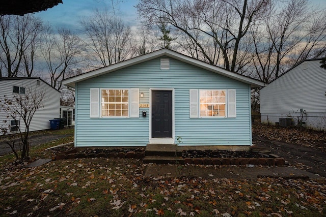 bungalow-style home featuring central AC