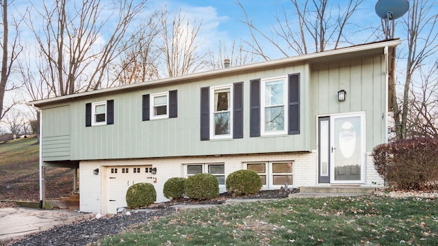 split foyer home featuring a garage