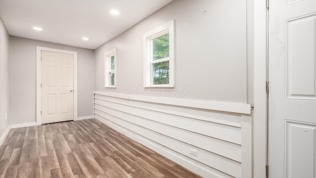 hall with light wood-type flooring