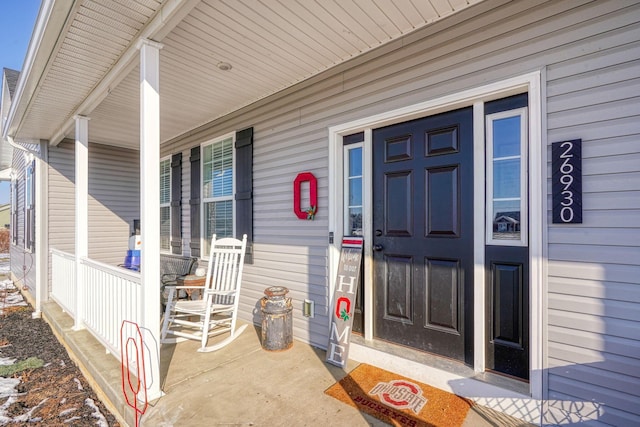 entrance to property with covered porch