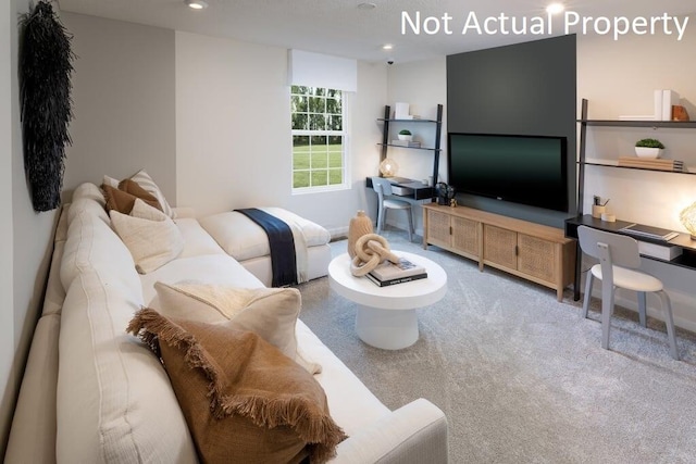 living room featuring carpet flooring and recessed lighting