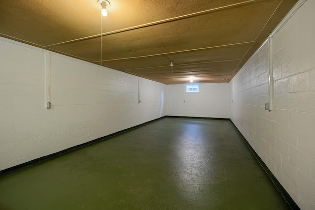 basement with a textured ceiling