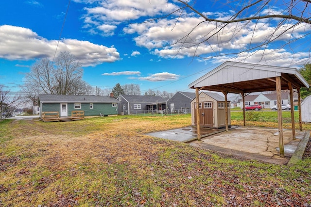 view of yard with a storage unit