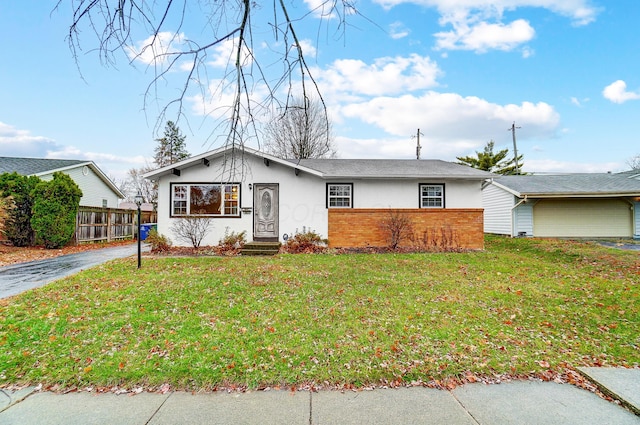 ranch-style house with a front yard