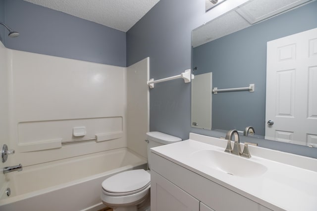 full bathroom featuring bathtub / shower combination, a textured ceiling, toilet, and vanity