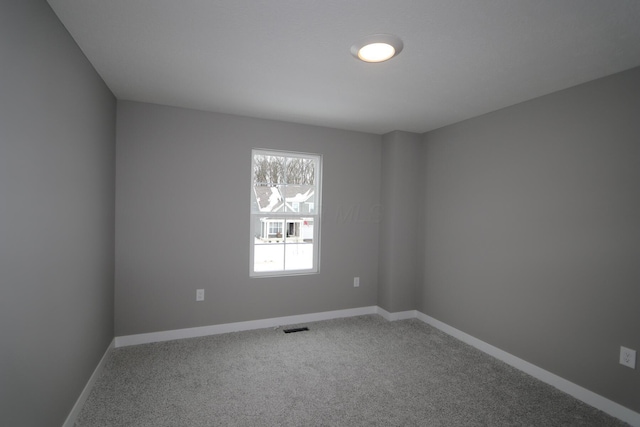 view of carpeted spare room