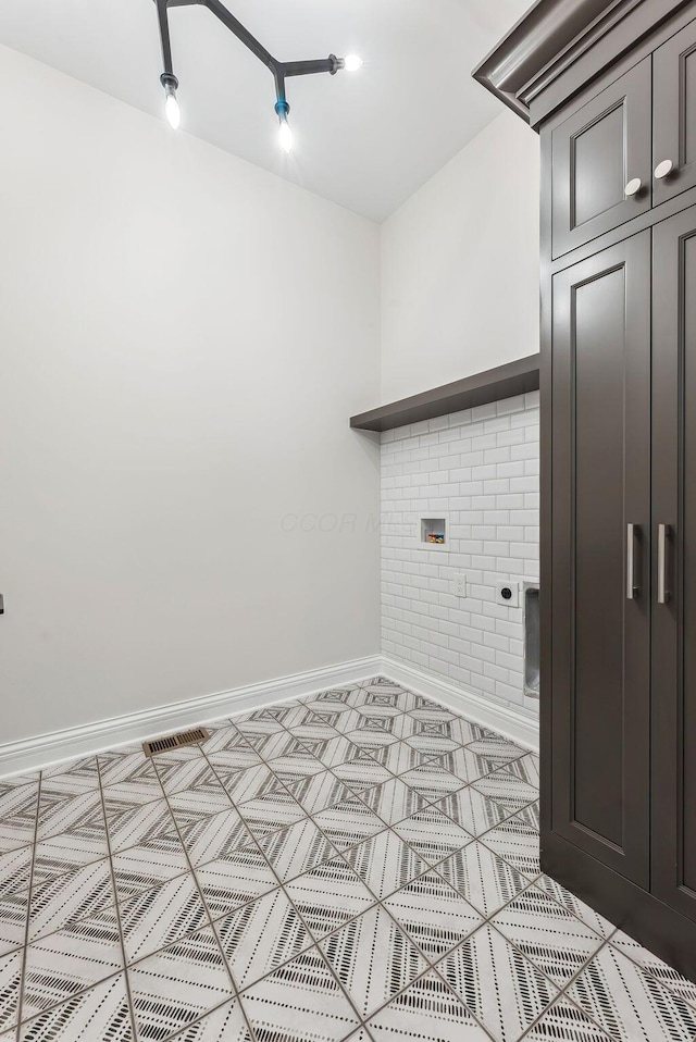 laundry area with hookup for a washing machine and electric dryer hookup