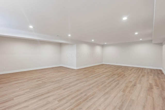 basement with light wood-type flooring