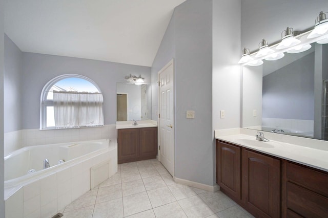 full bathroom featuring lofted ceiling, tile patterned flooring, a sink, and a bath