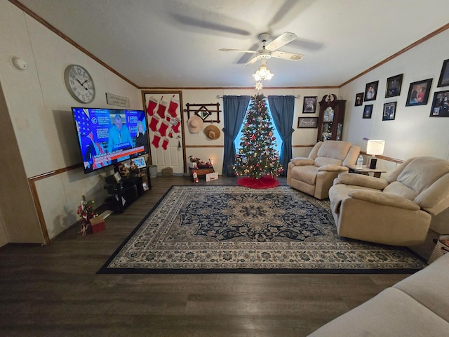 living room featuring ceiling fan, ornamental molding, and hardwood / wood-style flooring